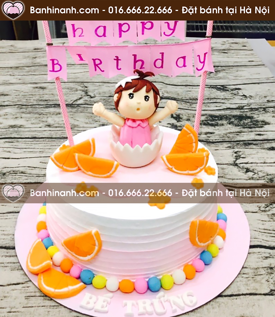 Bánh sinh nhật đẹp tạo hình bé gái bên cạnh những múi cam mọng nước 3706 - Bánh gato sinh nhật ngon đẹp